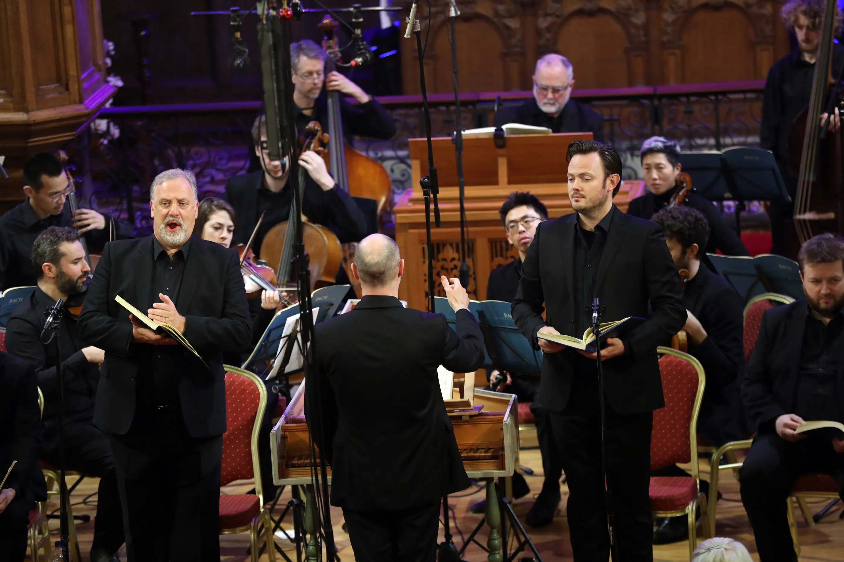 Matthew Brook singing with the Irish Baroque Orchestra in a candlelit church